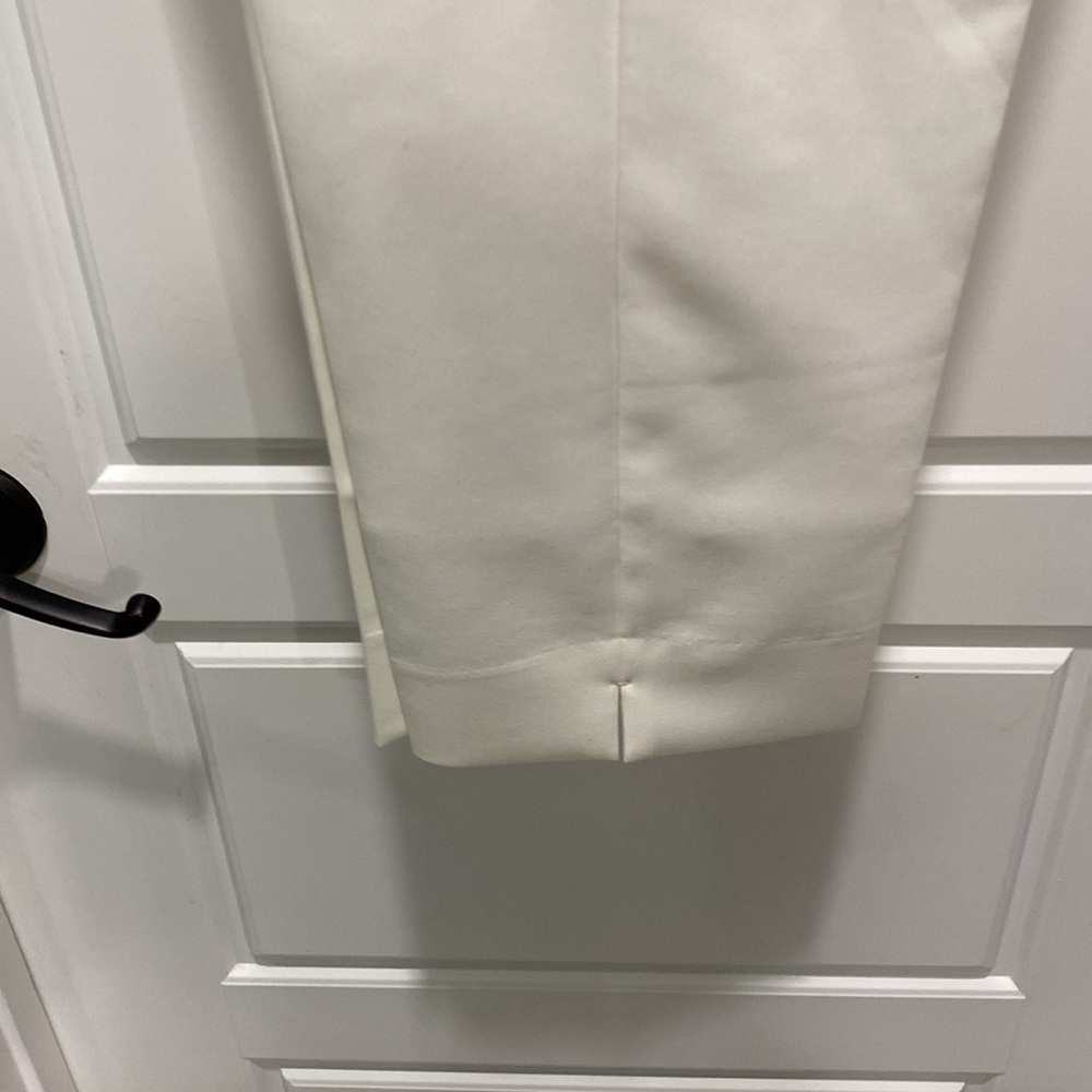 Cream, lined wool trousers. Ankle, with sit and side slit pockets. - Picture 2 of 3